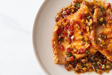 Fried Snapper Belly with Spicy Garlic Soy Sauce in Asian Style