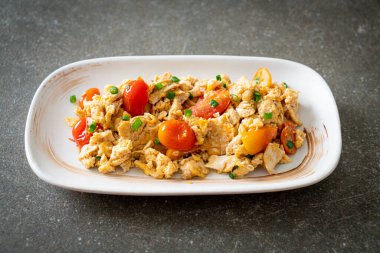 stir-fried tomatoes with egg on plate - healthy food style