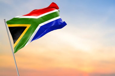 Güney Afrika ulusal bayrağı güneşli bulutlarda dalgalanıyor