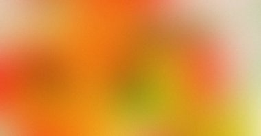 Yumuşak, canlı, soyut bir arka plan, turuncu, sarı ve yeşil bir gradyanı var. Bulanık doku pürüzsüz ve renkli bir zemin oluşturur.