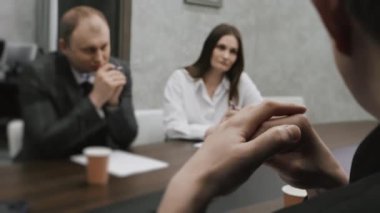 Business meeting in modern office, successful managers discussing project, sharing ideas. Colleagues working together, planning strategy. Concept of business
