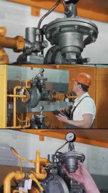 Korumalı miğfer ve üniformalı işçi sarı gaz boru hattını inceliyor. Dikey video.