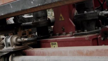 The machine operates horizontally at an inclined angle when laying pipes in the ground. The HDD machine makes a hole in the ground for laying underground utilities.