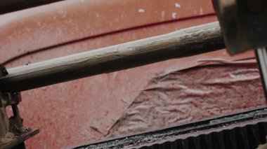 The machine operates horizontally at an inclined angle when laying pipes in the ground. The HDD machine makes a hole in the ground for laying underground utilities.