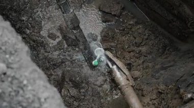 The process of laying a plastic gas pipe underground. Horizontal directional drilling for urban utilities.