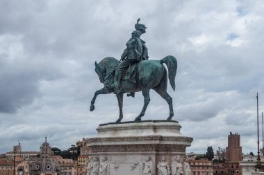 Rome, Italy, Vittoriano, equestrian statue of Vittorio Emanuele II, on whose marble base the statues of the noble cities are sculpted clipart