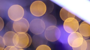 Bokeh, soyut şenlikli noel dokusu, altın bokeh parçacıkları ve koyu arkaplanda gölgeler