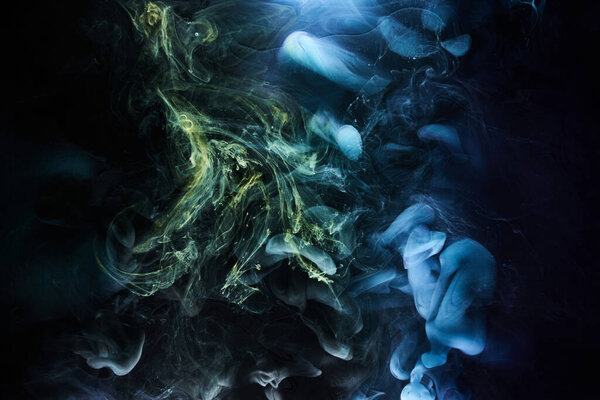 Dark blue abstract background, luxury multicolored smoke, acrylic paint underwater explosion, cosmic swirling ink