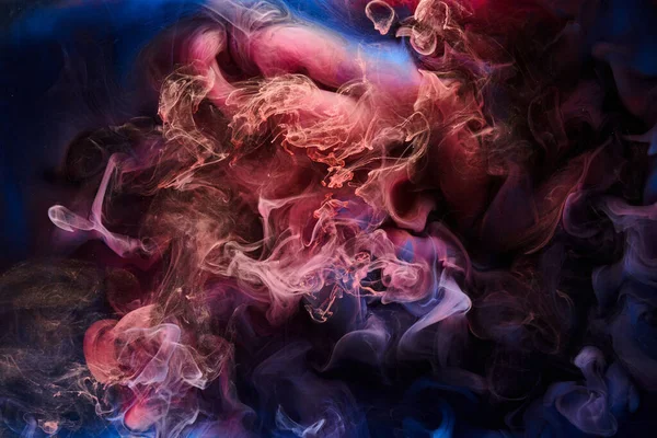 Blue red ink abstract background. Acrylic paint backdrop for perfume, hookah, cosmetics. Mysterious smoke clouds, colorful fog