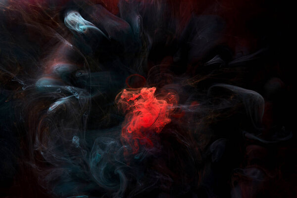 Contrasting red ink abstract background. Multi-colored acrylic paints backdrop for perfume, hookah, cosmetics. Mysterious smoke clouds, colorful fog