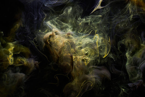 Yellow dark abstract background, luxury colored smoke, acrylic paint underwater explosion, cosmic swirling ink