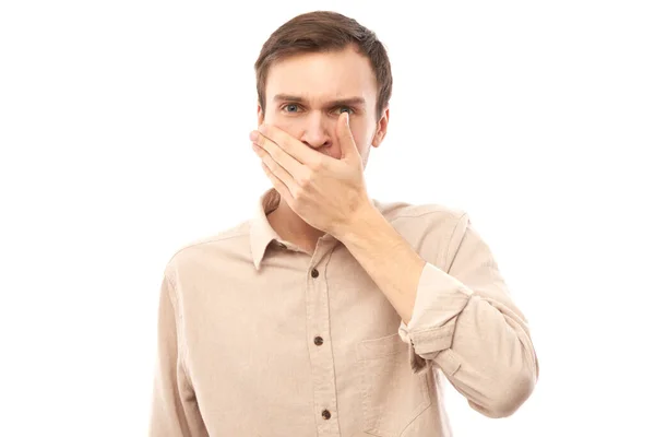 Молодой Человек Держит Нос Избежать Неприятного Запаха Щекочет Нос Рот — стоковое фото
