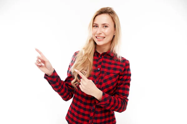 Joyful Blonde Girl Plaid Red Shirt Smiling Points Her Finger — Stock Photo, Image