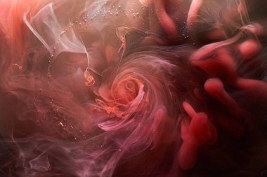 Kırmızı mürekkep soyut arka plan. Parfüm, nargile ve kozmetik ürünleri için akrilik boya arka planı. Gizemli duman bulutları, renkli sis