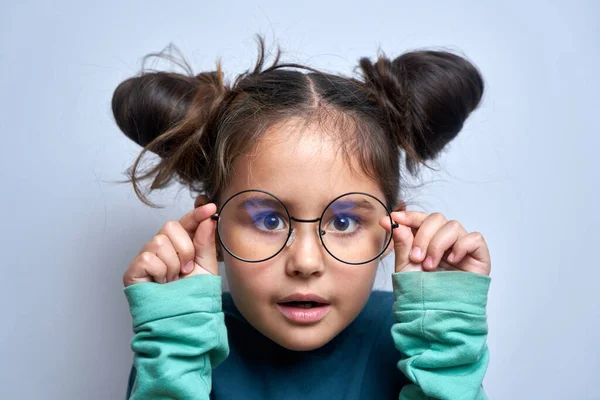 Caucasian Little Girl Wearing Glasses Squinting While Looking Camera Isolated — Stock Photo, Image