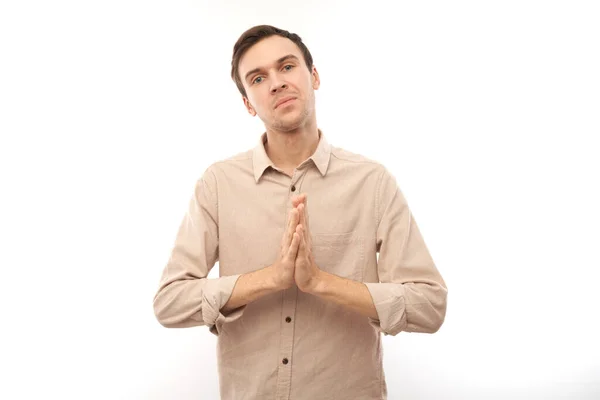 Portrait Young Brunette Man Folded His Hands Prayer Gesture Isolated — Stock Photo, Image