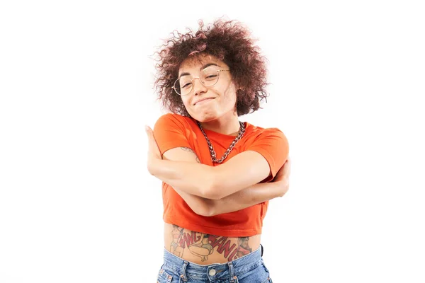 Young Curly Brunette Woman Hugging Herself Smiling Isolated White Studio — Stock Photo, Image