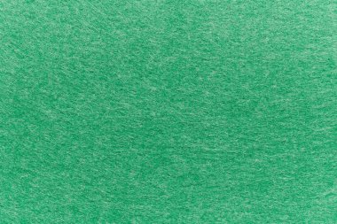 Soft felt textile material Classic Green colors, colorful texture flap fabric background closeup