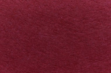 Soft felt textile material red pink colors, colorful texture flap fabric background closeup