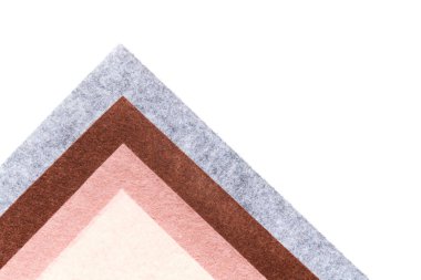 Multi-colored soft felt textile material, colorful patchwork texture fabric close-up