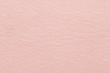 Soft felt textile material Tender Peach colors, colorful texture flap fabric background closeup