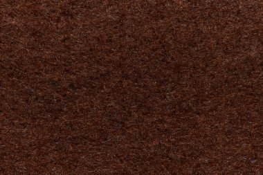 Soft felt textile material brown colors, colorful texture flap fabric background closeup