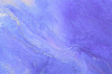 Luxury abstract background, liquid art. Blue alcohol ink with golden paint streaks, water surface, marble texture