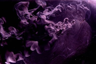 Black pink ocean background. Splashes and waves of sparkling paint under water, clouds of interstellar smoke in motion