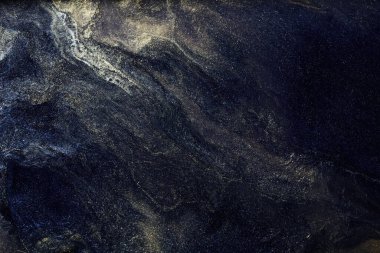Luxury abstract background, liquid art. Black gold paint mix, alcohol ink blots, marble texture. Modern print pattern