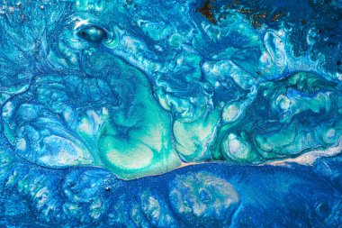 Luxury abstract background, liquid art. Blue alcohol ink with golden paint streaks, water surface, marble texture