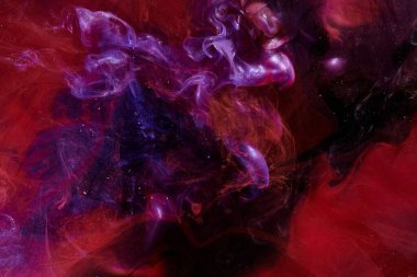 Pink lilac abstract ocean background. Splashes and waves of paint under water, clouds of interstellar smoke in motion