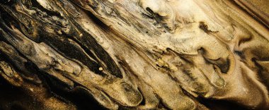 Luxury abstract background, liquid art. Black gold paint mix, alcohol ink blots, marble texture. Modern print pattern