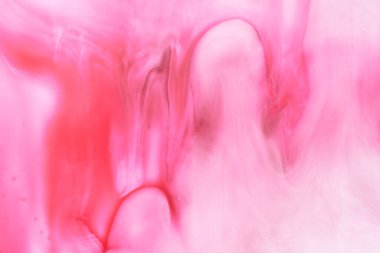 Abstract magenta background. Alcohol ink streaks and stains of wine color, paint splashes