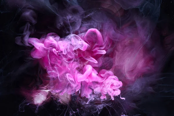 Black pink ocean background. Splashes and waves of sparkling paint under water, clouds of interstellar smoke in motion