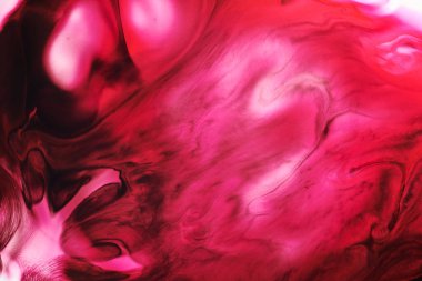 Abstract magenta background. Alcohol ink streaks and stains of wine color, paint splashes