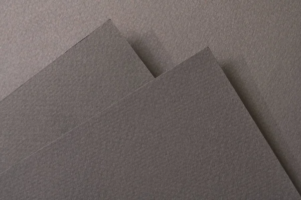 ラフなクラフト紙の背景 紙の質感黒灰色の異なる色合い テキストのコピースペースを持つモックアップ — ストック写真