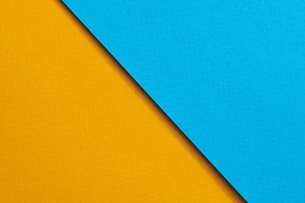 Rough kraft paper background, paper texture blue orange colors. Mockup with copy space for text