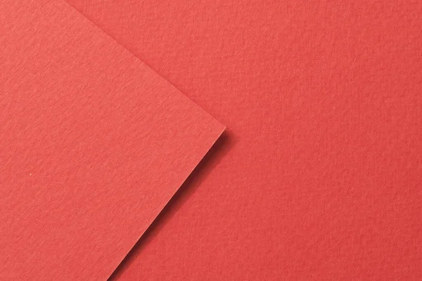 Rough kraft paper pieces background, geometric monochrome paper texture red color. Mockup with copy space for text