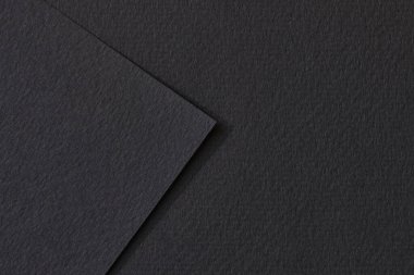 Kaba Kraft kağıt parçaları arka plan, geometrik monokrom kağıt dokusu siyah renk. Metin için kopyalama alanı olan bir model