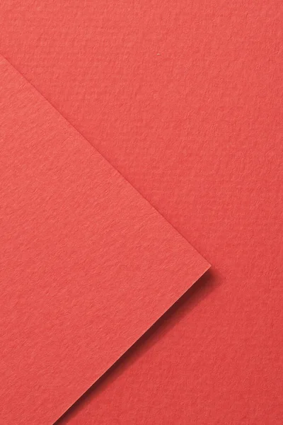 Rough kraft paper pieces background, geometric monochrome paper texture red color. Mockup with copy space for text