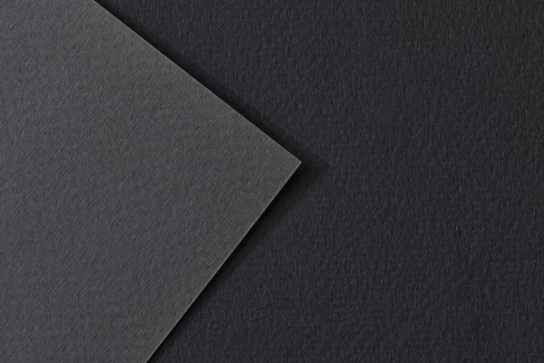 Rough kraft paper background, paper texture black gray colors. Mockup with copy space for text