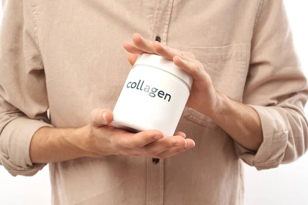 Close Male Hands Holding Jar Collagen Powder His Hands Isolated — Stock Photo, Image