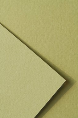 Kaba Kraft kağıt parçaları arka plan, geometrik monokrom kağıt dokusu soluk yeşil renk. Metin için kopyalama alanı olan bir model