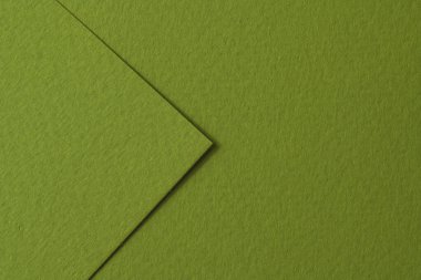 Kaba Kraft kağıt parçaları arka plan, geometrik monokrom kağıt dokusu yeşil renk. Metin için kopyalama alanı olan bir model
