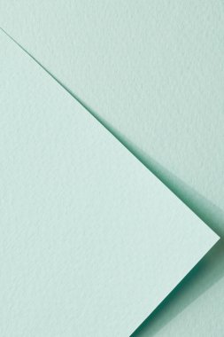 Kaba Kraft kağıt parçaları arka plan, geometrik monokrom kağıt dokusu nane rengi. Metin için kopyalama alanı olan bir model