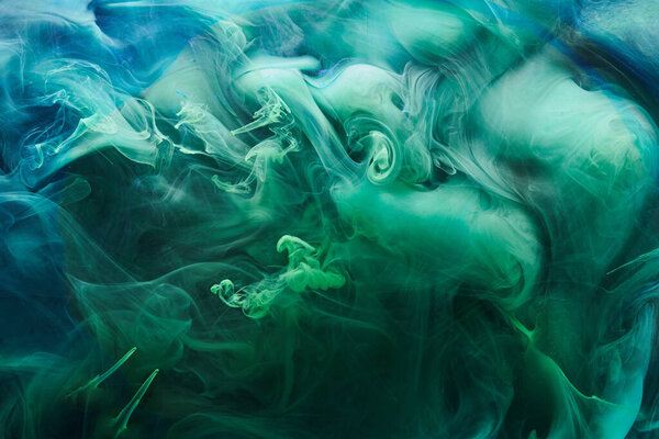 Green blue contrast liquid art background. Paint ink explosion, abstract clouds of smoke mock-up, watercolor underwater