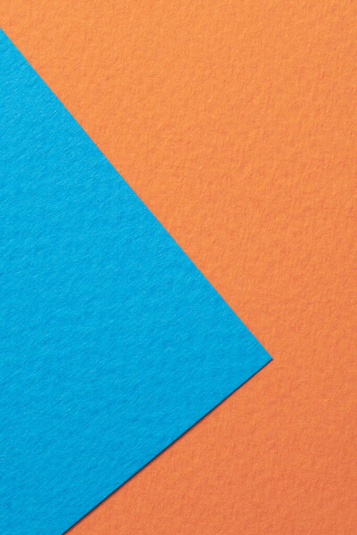 Rough kraft paper background, paper texture orange blue colors. Mockup with copy space for text