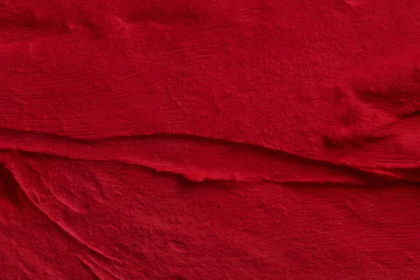 Dekorativ Röd Kitt Bakgrund Väggstruktur Med Fyllnadspasta Applicerad Med Spatel — Stockfoto