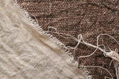 Farklı dokularda ve renklerde çarşaf. Doğal kumaşlar organik keten ve pamuktan, el yapımı tekstil. Eko, kırsal, boho, hygge dekor kapatma arkaplanı için çuval bezi ve tuval