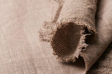 Farklı dokularda ve renklerde çarşaf. Doğal kumaşlar organik keten ve pamuktan, el yapımı tekstil. Eko, kırsal, boho, hygge dekor kapatma arkaplanı için çuval bezi ve tuval